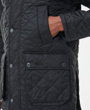 Load image into Gallery viewer, Model wearing Barbour Ashby Quilt in Black.
