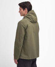 Load image into Gallery viewer, Model wearing Barbour Quay Showerproof Jacket in Olive - back.
