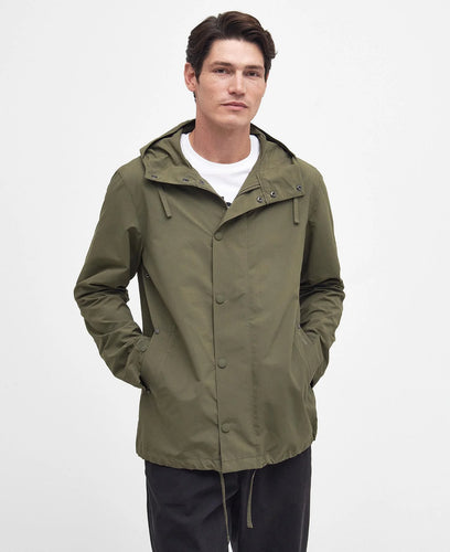 Model wearing Barbour Quay Showerproof Jacket in Olive.