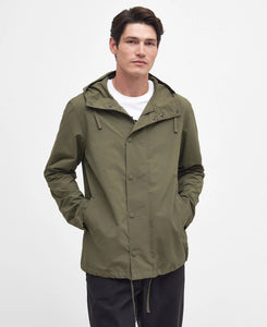 Model wearing Barbour Quay Showerproof Jacket in Olive.