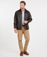 Load image into Gallery viewer, Model wearing Barbour Bedale Wax Jacket in Rustic.
