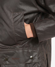 Load image into Gallery viewer, Model wearing Barbour Bedale Wax Jacket in Rustic.
