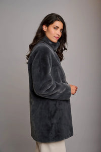 Model wearing Rino & Pelle - Nonna Jacket in Night.