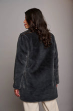 Load image into Gallery viewer, Model wearing Rino &amp; Pelle - Nonna Jacket in Night - back.
