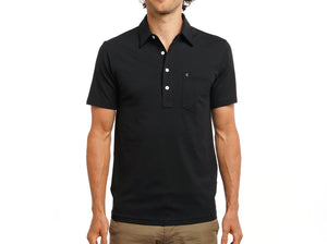 Model wearing  Criquet - Top-Shelf Players Polo in Black Top.