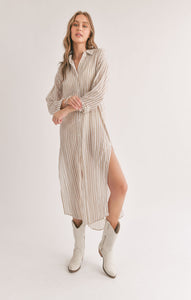 Model wearing Sadie & Sage - Sands Thinstripe Outer Layer Duster Shirt in Ivory/Taupe.