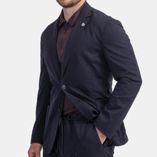 Load image into Gallery viewer, Model wearing TMB - Performance Travel Sportcoat G1J1 in Navy.

