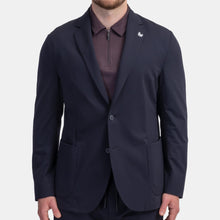 Load image into Gallery viewer, Model wearing TMB - Performance Travel Sportcoat G1J1 in Navy.
