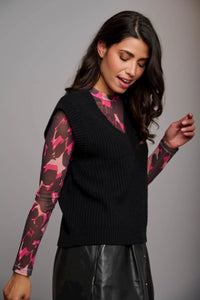 Model wearing Rino & Pelle - Unna V-Neck Sweater Vest in Black.
