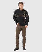 Load image into Gallery viewer, Model wearing Rodd &amp; Gunn - Motion Melange Straight Fit Jean in Nutmeg.
