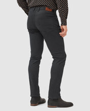 Load image into Gallery viewer, Model wearing Rodd &amp; Gunn - Motion Melange Straight Fit Jean in Onyx - back.
