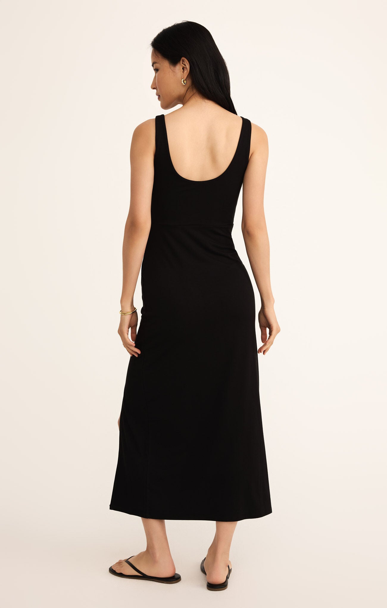 Model wearing ZSupply Valencia Midi Dress in Black - back.