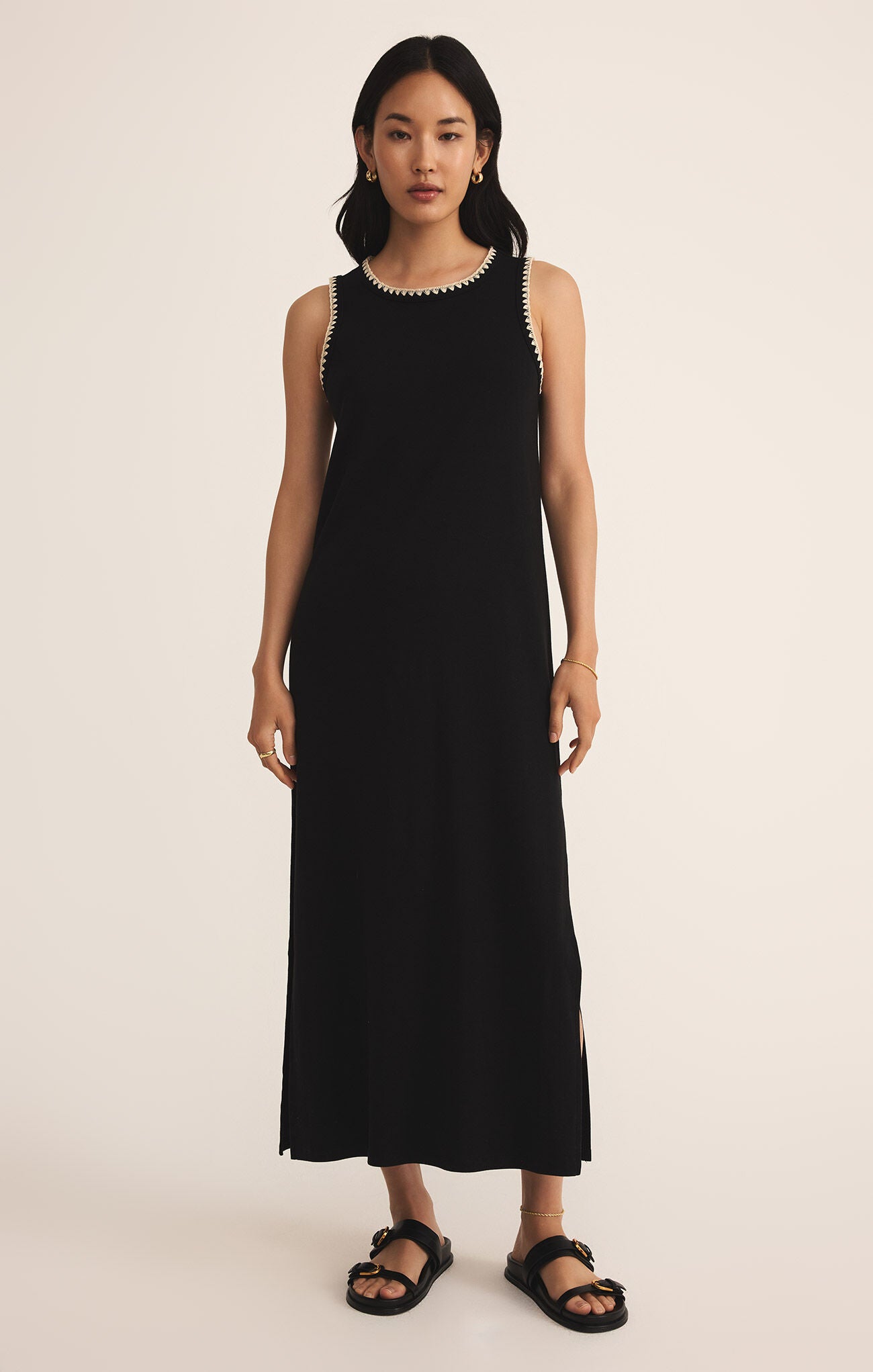 Model wearing ZSupply Delamer Midi Dress in Black.