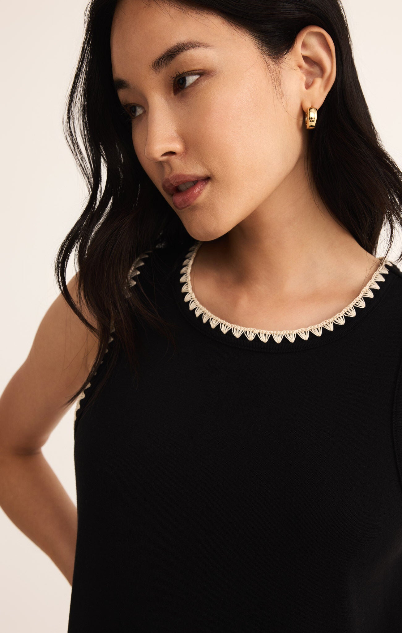 Model wearing ZSupply Delamer Midi Dress in Black.