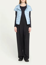 Load image into Gallery viewer, Model wearing Herno Women&#39;s Iconic Nylon Ultralight Cap Sleeve Jacket Celeste.
