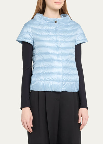 Model wearing Herno Women's Iconic Nylon Ultralight Cap Sleeve Jacket Celeste.