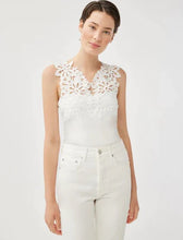 Load image into Gallery viewer, Model wearing Leo &amp; Ugo - Elsa Lace Top in white.
