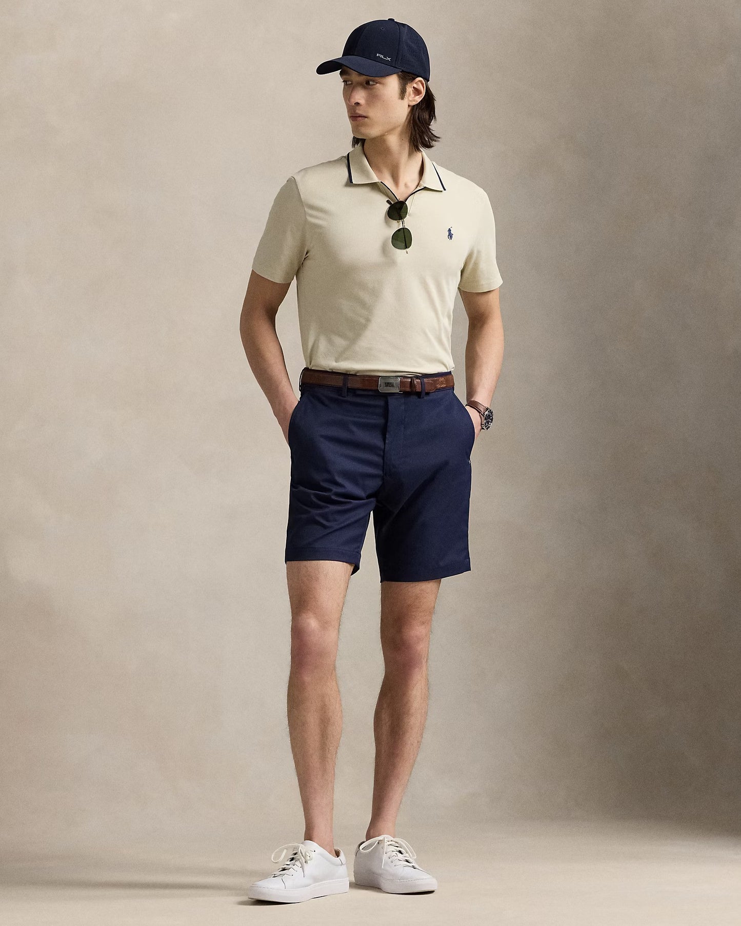 Model wearing RLX - Ralph Lauren 9-Inch Tailored Fit Performance Short in Navy.