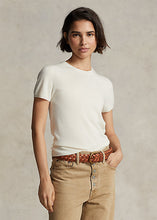 Load image into Gallery viewer, Model wearing Polo Ralph Lauren - Cashmere Short Sleeve Crewneck in Cream.
