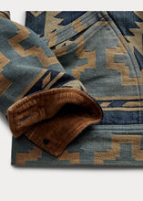 Load image into Gallery viewer, RRL - Valero Cotton Indigo Denim Jacquard Trucker Jacket in Indigo/Yellow/Tan Multi.
