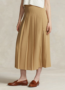 Model wearing Polo Ralph Lauren - Satin Pleated A-Line Midi Skirt in Camel.