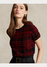 Load image into Gallery viewer, Model wearing Polo Ralph Lauren - Plaid Wool Short Sleeve Sweater in Red/Black Plaid.
