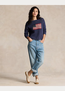 Model wearing Polo Ralph Lauren - Flag Pointelle Cotton-Linen Sweater in Blue Multi.