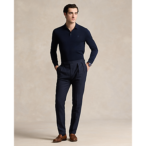 Model wearing POLO Ralph Lauren - LS Merino Wool Button Placket Polo Sweater in Hunter Blue.