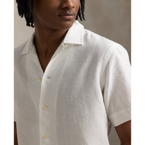 Model wearing  POLO Ralph Lauren - SS Garment Dyed Slubby Linen Andy Camp Shirt in Ceramic White.