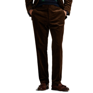 Model wearing POLO Ralph Lauren - 8 Wale Corduroy Chester Trouser in Chestnut.