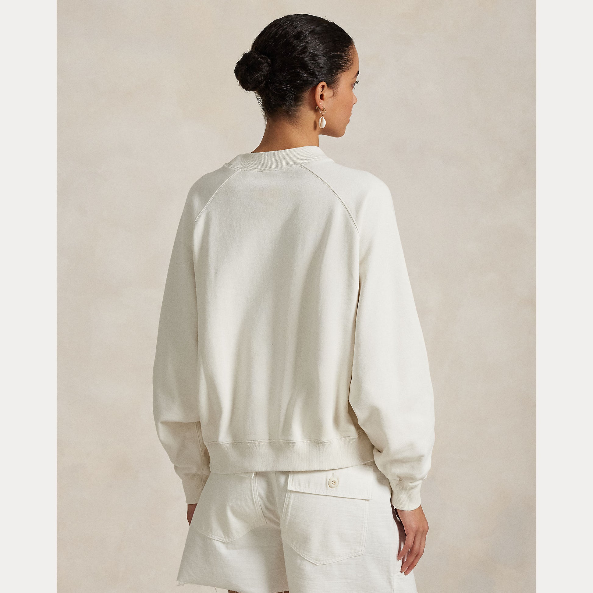 Model wearing Polo Ralph Lauren - Logo Flag French Terry Crewneck Sweatshirt in Nevis - back.