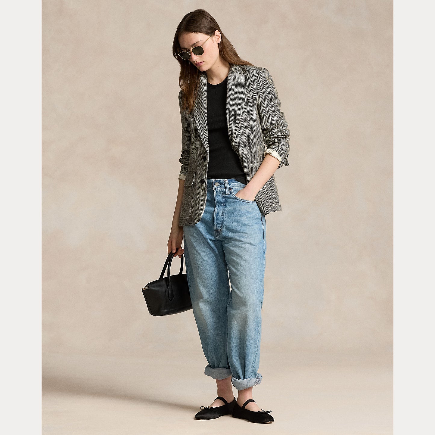 Model wearing Polo Ralph Lauren - Herringbone Linen Blend Heritage Blazer in Black/Cream Herringbone.