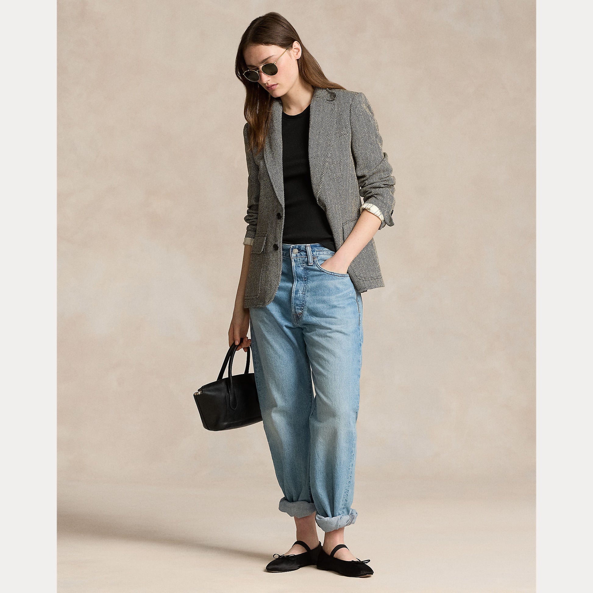 Model wearing Polo Ralph Lauren - Herringbone Linen Blend Heritage Blazer in Black/Cream Herringbone.