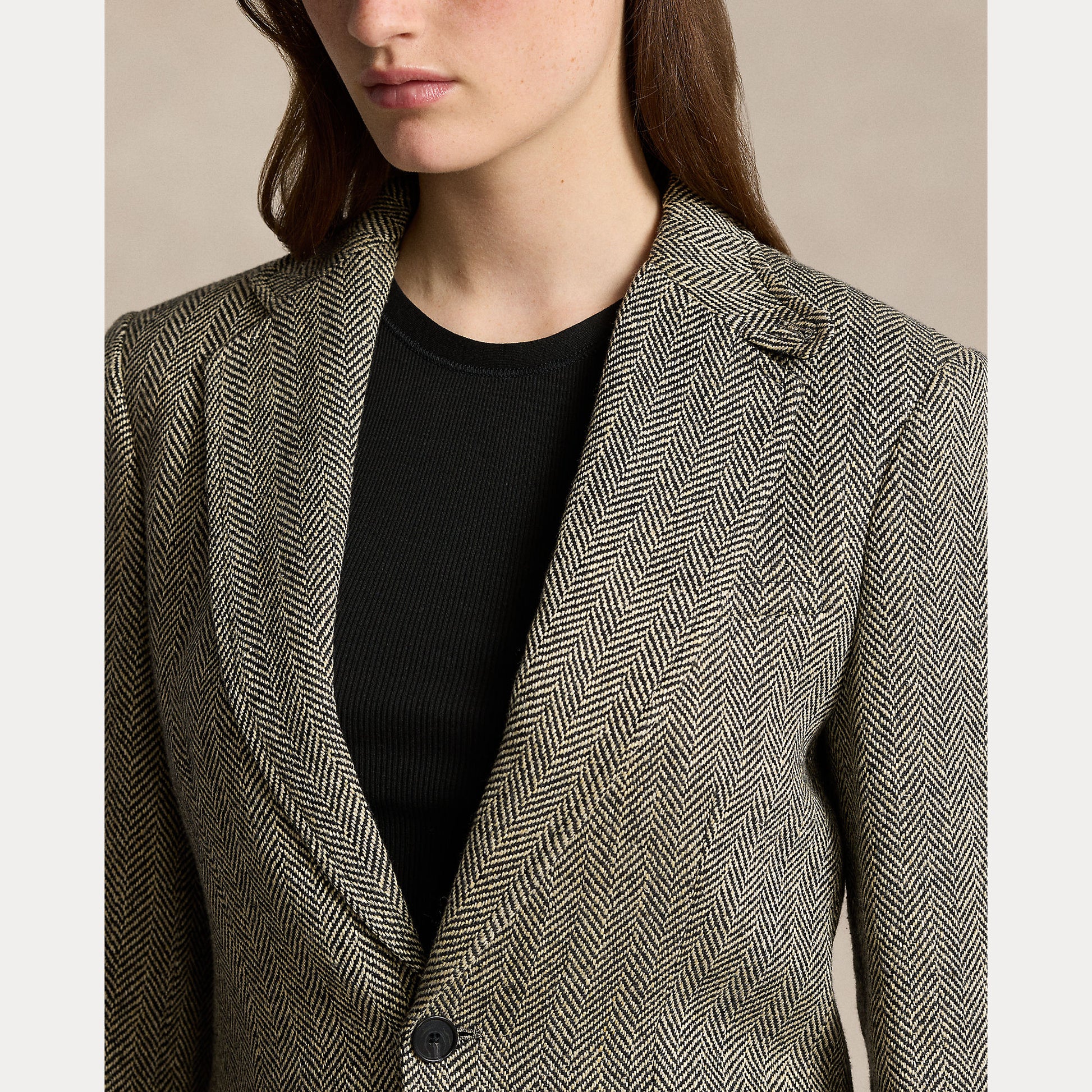 Model wearing Polo Ralph Lauren - Herringbone Linen Blend Heritage Blazer in Black/Cream Herringbone.