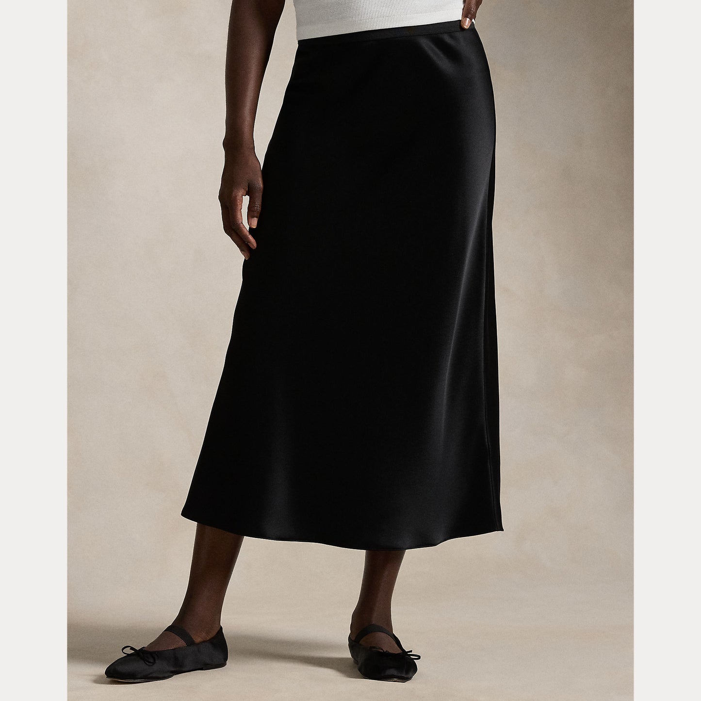 Model wearing Polo Ralph Lauren - Satin Skirt in Black.