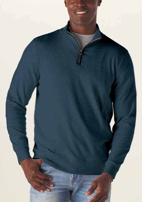 Model wearing The Normal Brand - Puremeso Weekend Quarter Zip in Indigo Blue.