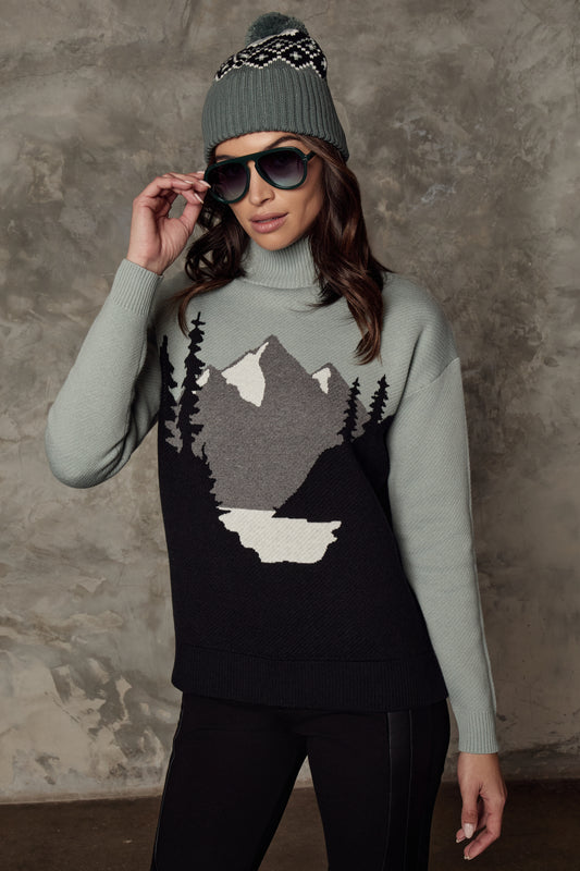 Model wearing Alp N Rock - Simran Mockneck Sweater in Silver Blue.