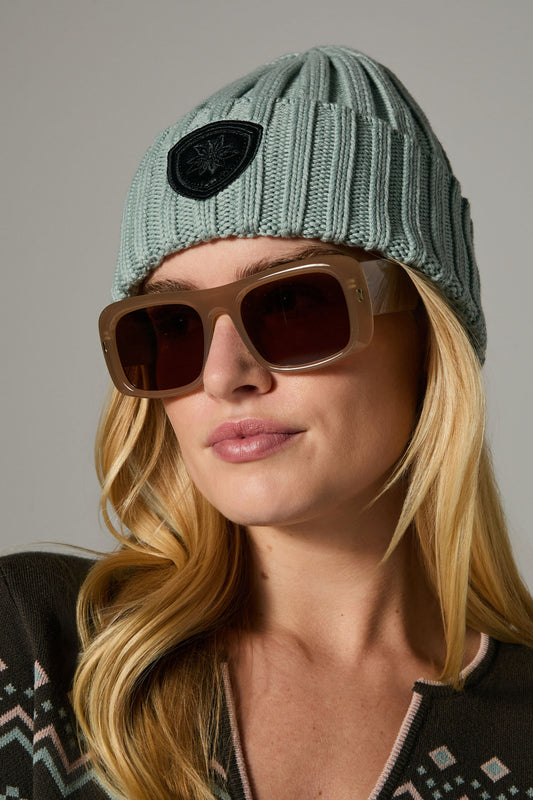 Model wearing Alp N Rock - Adel Rib Beanie in Silver Blue.