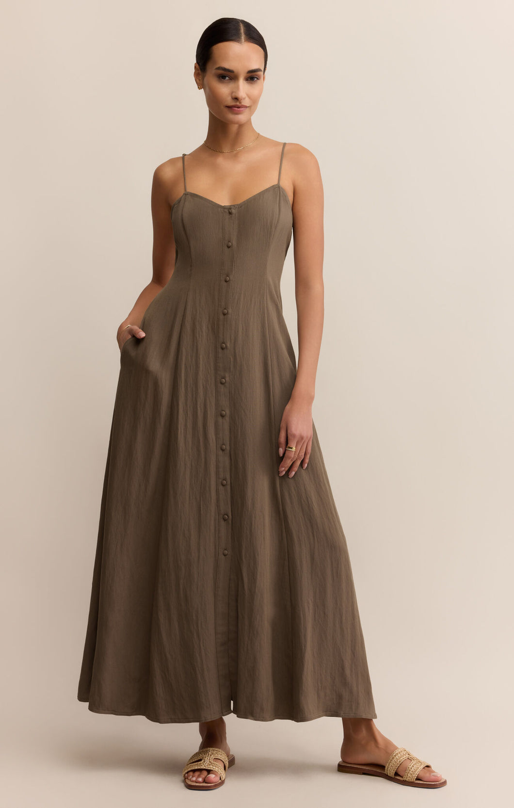 Model wearing ZSupply Angel Eyes Midi Dress in Tiki.