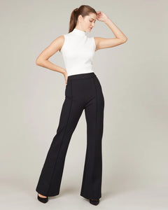 Model wearing Spanx - The Perfect Pant, Hi-Rise Flare in Classic Black 20252R.