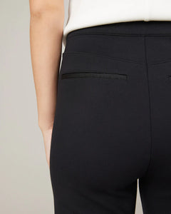 Model wearing Spanx - The Perfect Pant, Hi-Rise Flare in Classic Black 20252R - back.