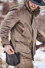 Load image into Gallery viewer, Model wearing Tom Beckbe Tensaw jacket in tobacco.

