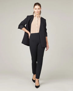 Model wearing Spanx - The Perfect Pant, Slim Straight in Classic Black 20254R.