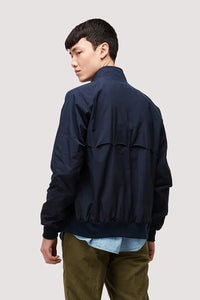 Model wearing Baracuta - G9 Harrington Jacket in Navy - back..