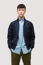 Load image into Gallery viewer, Model wearing Baracuta - G9 Harrington Jacket in Navy.
