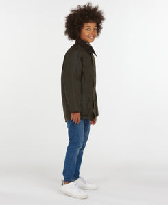 Model wearing Barbour Youth Beaufort Jacket in Olive.