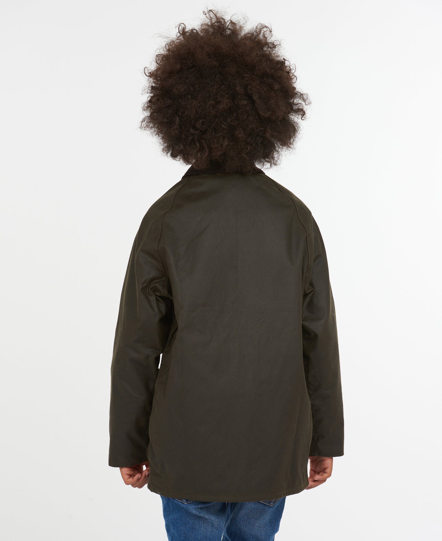 Model wearing Barbour Youth Beaufort Jacket in Olive.