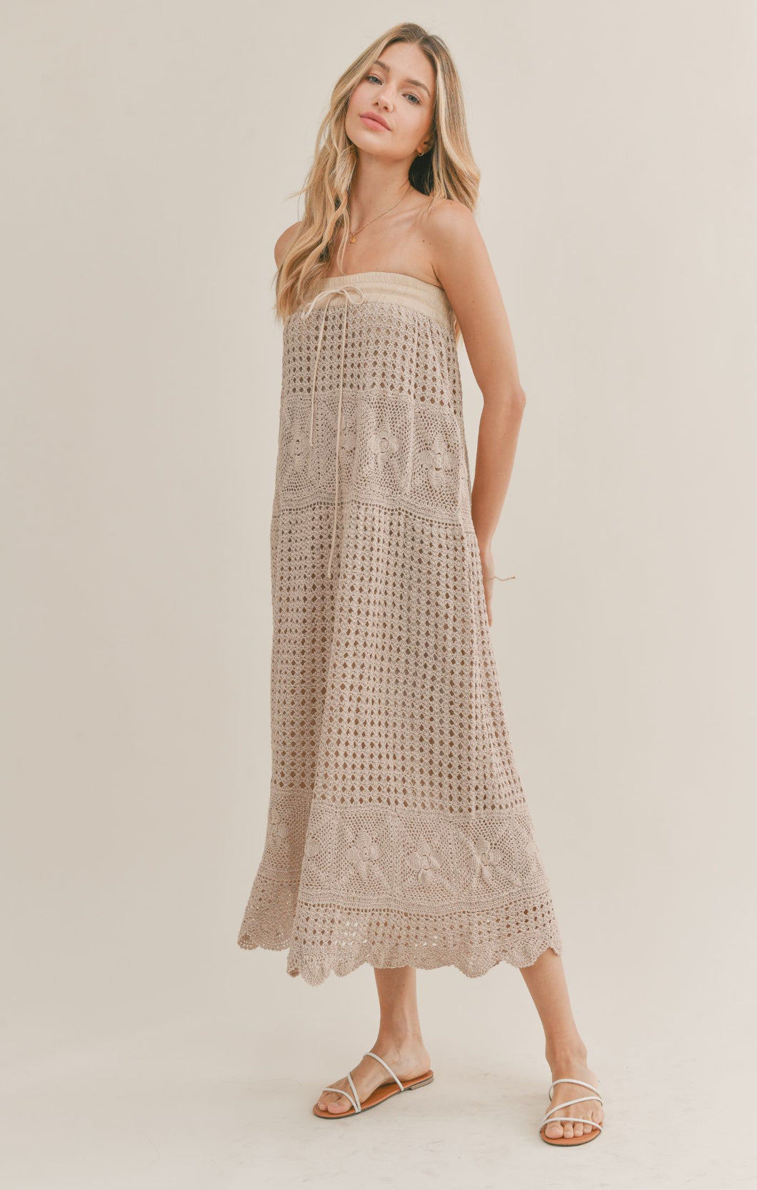 Model wearing Sadie & Sage - Got Me Hooked Hand Crochet Midi Dress in Taupe.