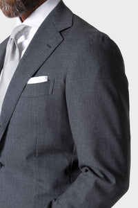 Model wearing Ring Jacket Calm Twist suit - grey.