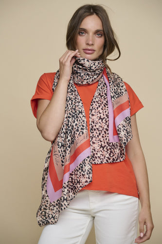 Model wearing Rino & Pelle - Jemma Scarf in Leopard.